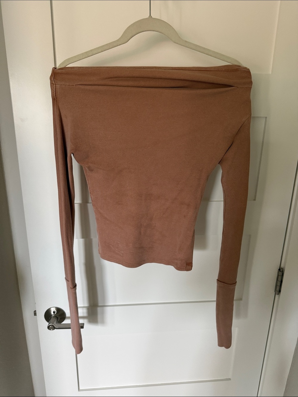 Women’s off shoulder t shirt in nude color.